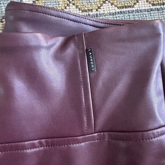Faux leather burgundy leggings. They have a soft lining. Very comfortable! - Picture 3 of 4